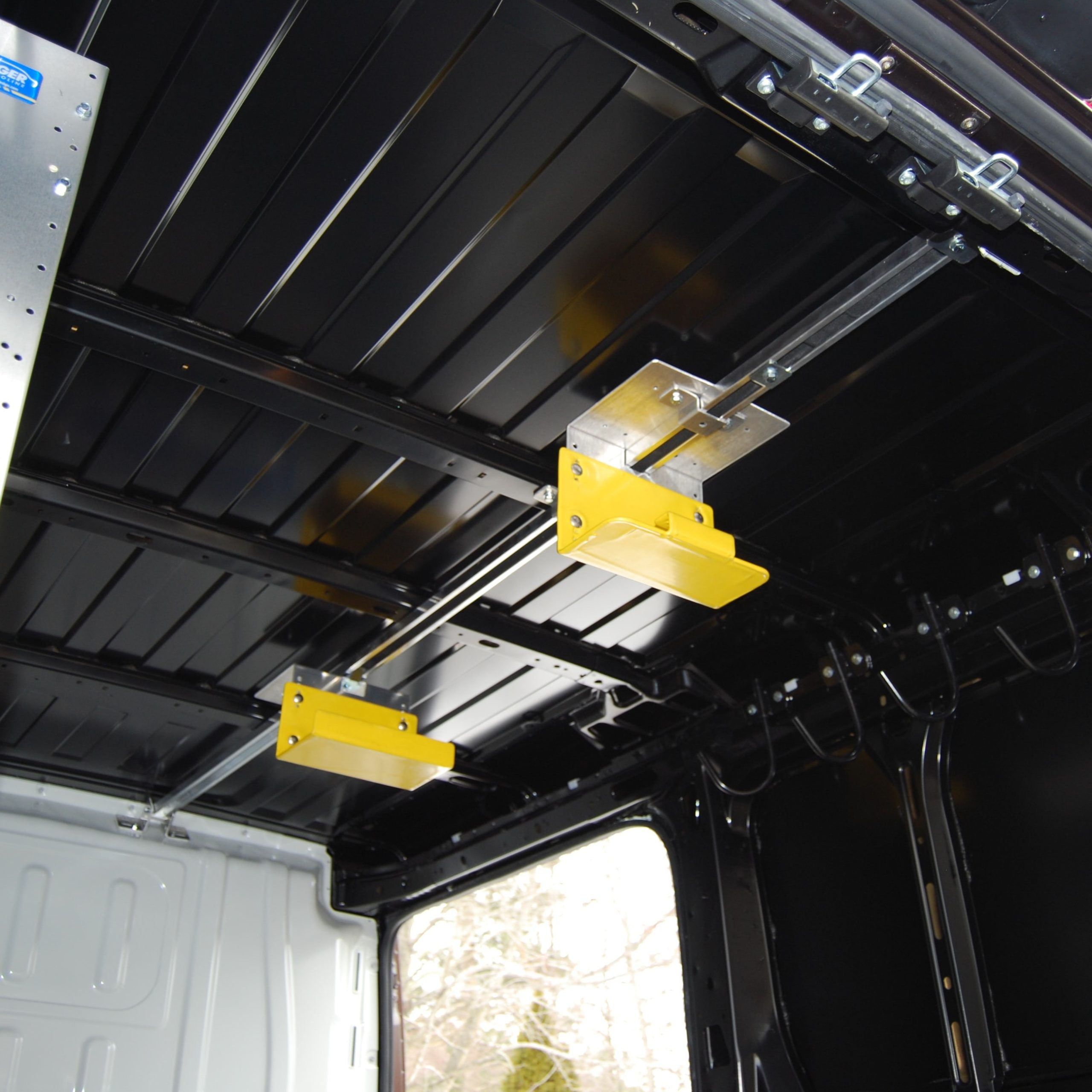 Inside ladder outlet rack for van